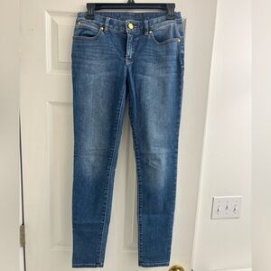 Michael Kors medium wash skinny jeans